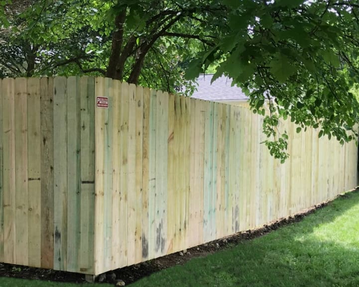 Residential Green-Treated Wood Solid Board Dog Ear Privacy Fence
